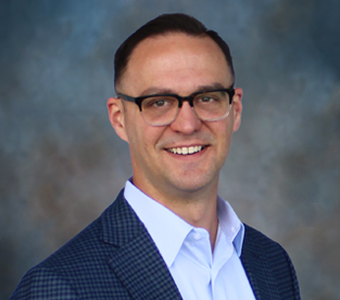 portrait photo of Taylor J. Atchley, MD